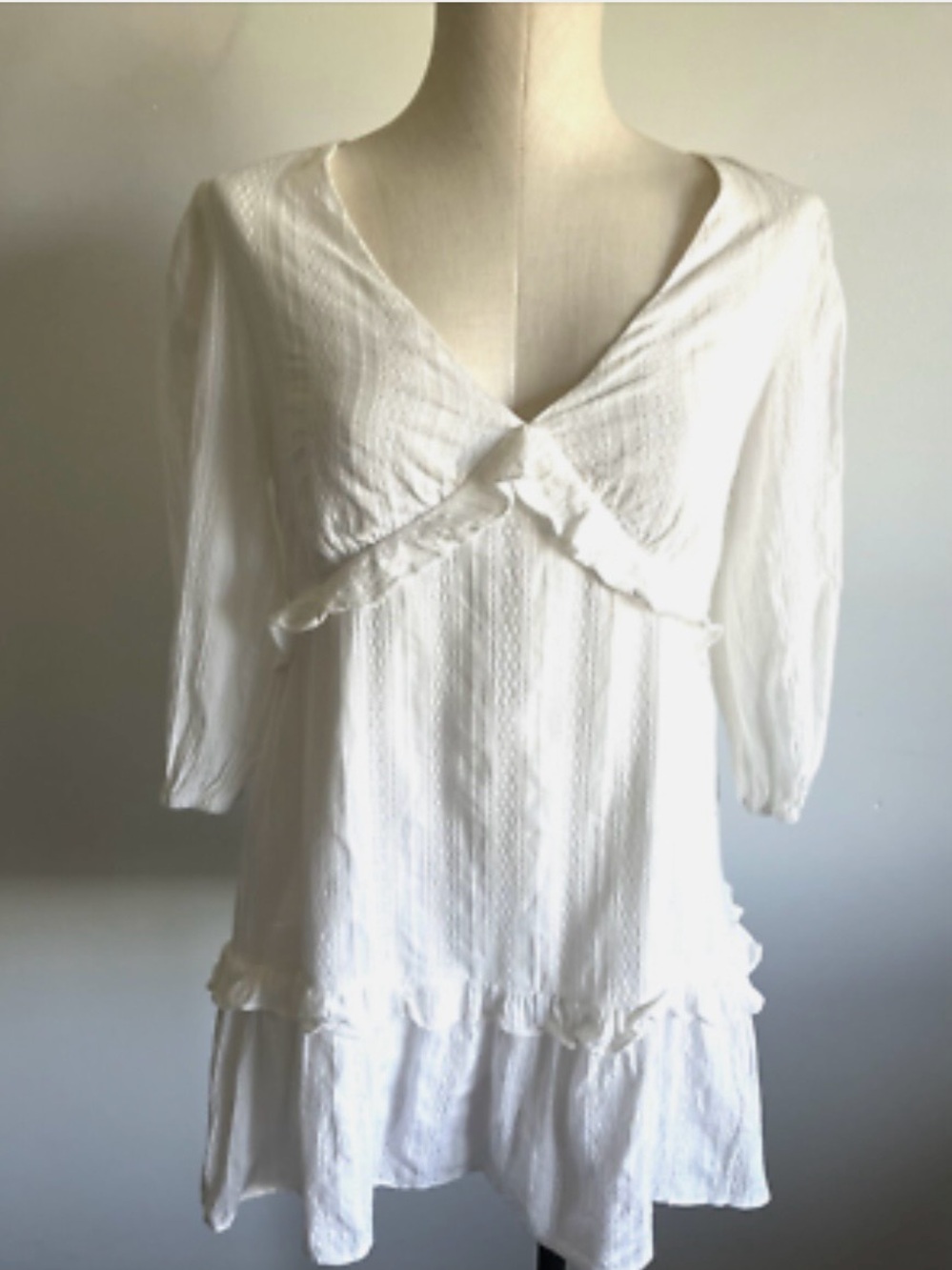 Lush white v-neck tiered babydoll tunic / mini dress.